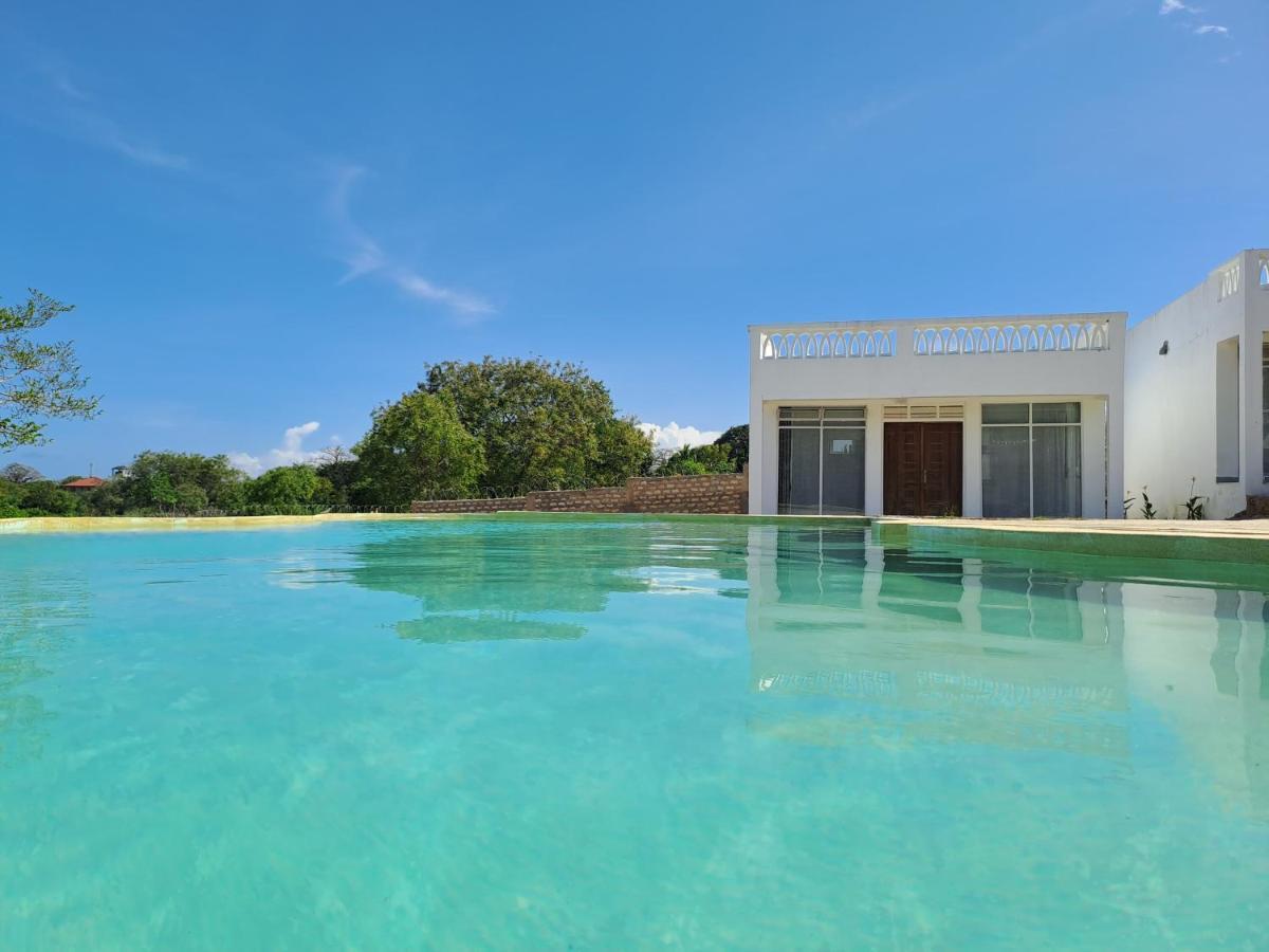 Cave Diani Holiday Apartments Diani Beach Exterior photo