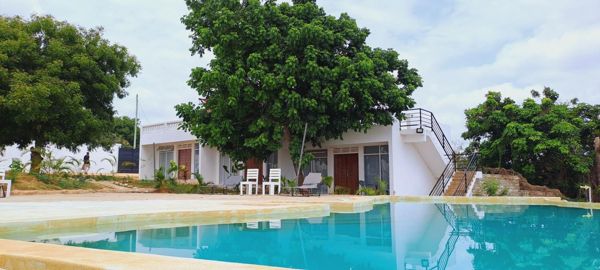 Cave Diani Holiday Apartments Diani Beach Exterior photo