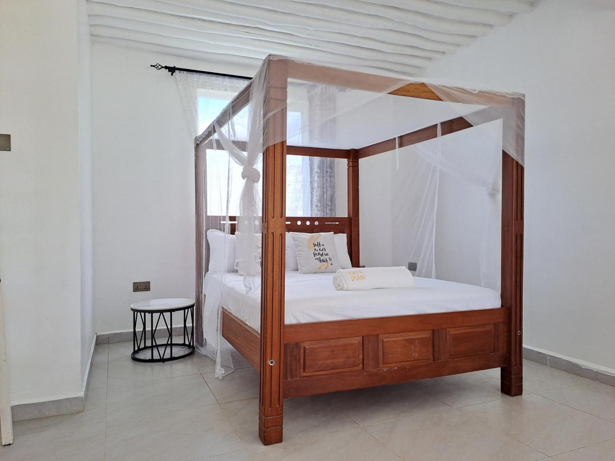 Cave Diani Holiday Apartments Diani Beach Exterior photo